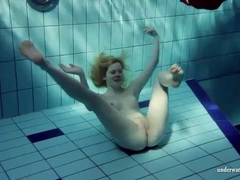 Free Kilo Movies presents: Blonde goes for a swim and strips