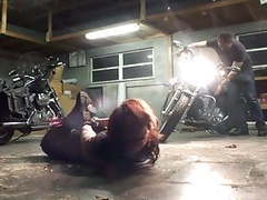 Free Kilo Movies presents: Biker girl hogtied in the garage