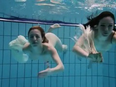 Free Kilo Movies presents: Nearly naked girls go swimming in the pool