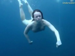 Free Kilo Movies presents: Three ladies get naked swimming in the ocean