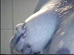 Free Kilo Movies presents: Freckled redhead milf plays with her nipples in bath