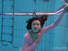 Free Kilo Movies presents: Leggy girl goes swimming in her leotard
