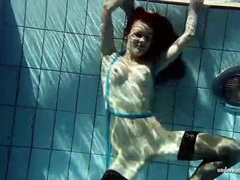 Free Kilo Movies presents: In black stockings pretty girl goes for a swim