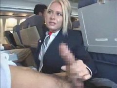 Free Kilo Movies presents: Stewardess gives a handy j on plane