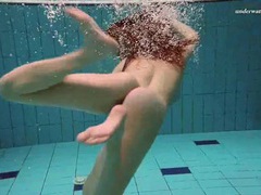 Free Kilo Movies presents: Underwater with a busty naked babe as she swims