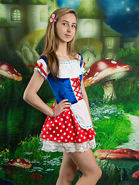 Free Kilo Movies presents: Very hot blonde teen beauty in an adorable outfit slowly takes it off to reveal her nice and perky boobs