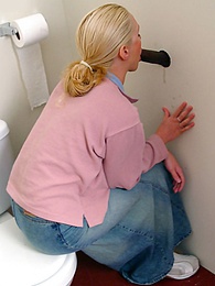 Free Kilo Movies presents: Blonde girl Jamie sits on the toilet and blows a black gloryhole dong