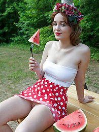 Free Kilo Movies presents: Nice belarusian stunner Rokki removes all clothes on a blanket in a backyard