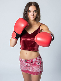 Free Kilo Movies presents: Sexy Ukrainian belle Oxana Chic strips off her clothes and poses nude in a gym